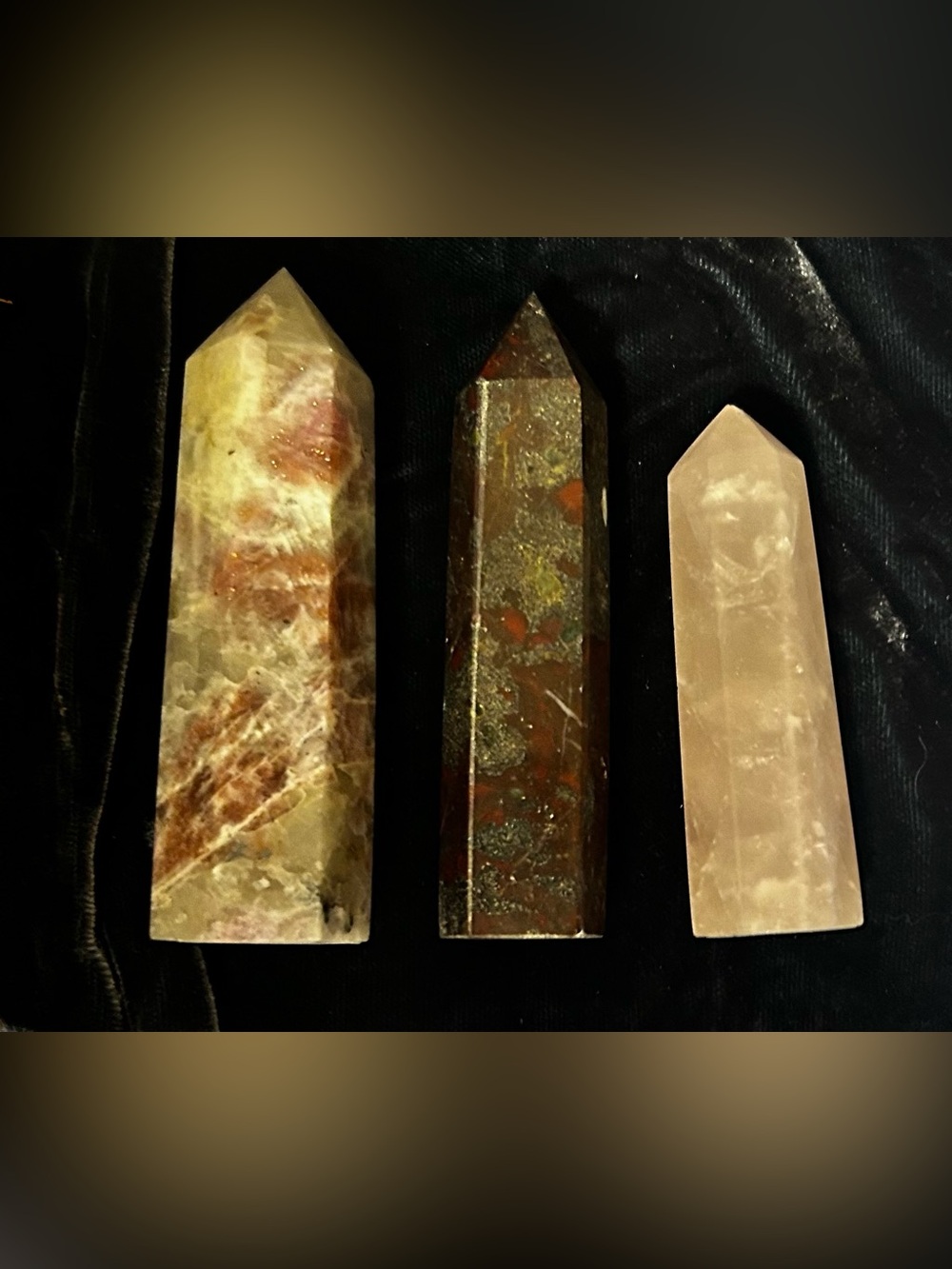 Carved stone tower trio